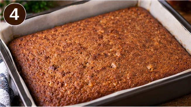 Baked Lebkuchen bars in the pan before glazing
